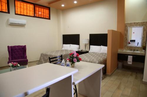 Posezení v ubytování Hotel Plaza Bernal