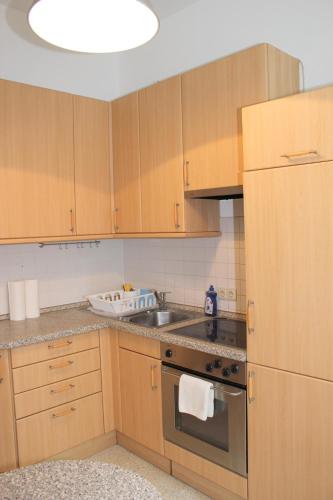 Η κουζίνα ή μικρή κουζίνα στο Kaiser Apartments
