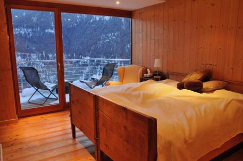 Krevet ili kreveti u jedinici u okviru objekta Chalet E Toue