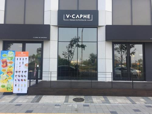 a building with a sign in front of it at Royal Emporium Incheon Airport in Incheon