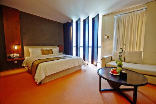 Katil atau katil-katil dalam bilik di Hotel MoMc