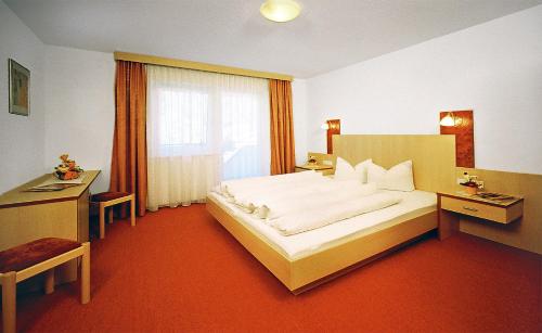 Säng eller sängar i ett rum på Gästehaus Mrak