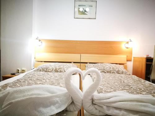 Katil atau katil-katil dalam bilik di Rooms Aračić