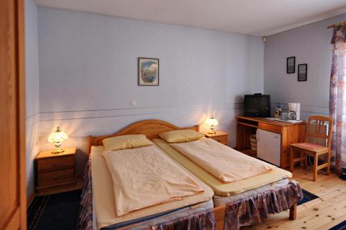 Кровать или кровати в номере Villa Johanna Guesthouse