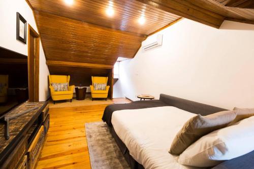 Cama o camas de una habitación en Ola Lisbon - Terrace Castelo VI