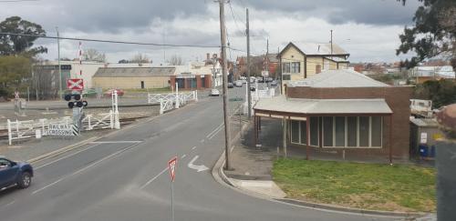 a street with a building on the side of a road at The Eastern Hotel Accommodation in Ballarat