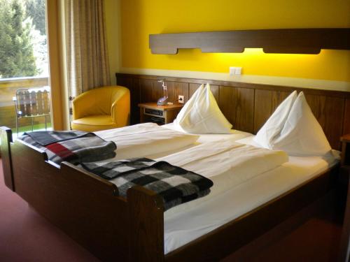 Ein Bett oder Betten in einem Zimmer der Unterkunft Gästehaus Sagmeister