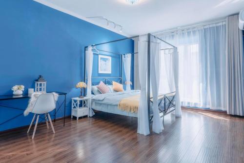 Un pat sau paturi într-o cameră la Xi'an Lianhu·Moslem Street (Huimin Jie)· Locals Apartment 00172050