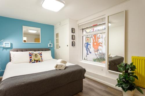 Postel nebo postele na pokoji v ubytování Notting Hill Residences