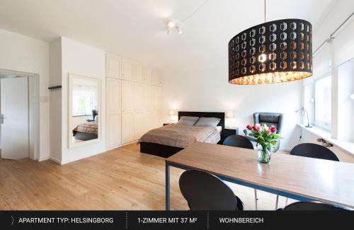 Ένα ή περισσότερα κρεβάτια σε δωμάτιο στο HEJ Apartments Bayreuth