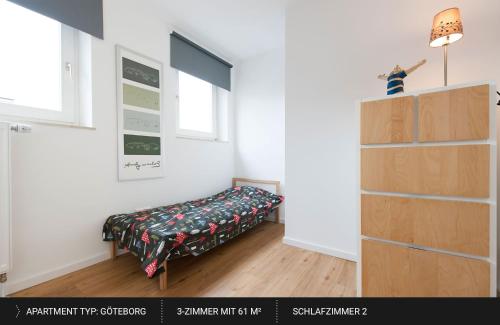 Säng eller sängar i ett rum på HEJ Apartments Bayreuth