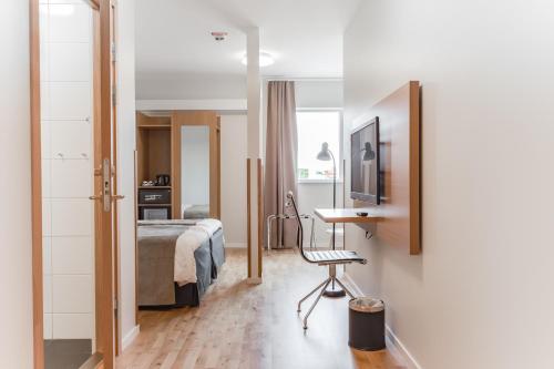 Postel nebo postele na pokoji v ubytování Hotel Spekeröd