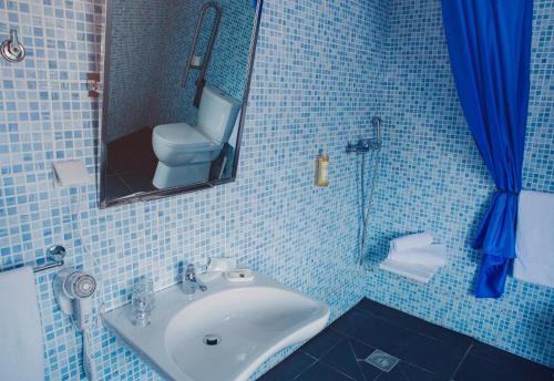 Ένα μπάνιο στο Hotel Império do Rei