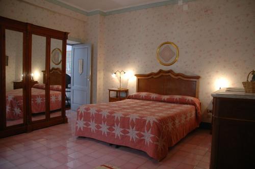 Ένα ή περισσότερα κρεβάτια σε δωμάτιο στο Agriturismo Mustilli