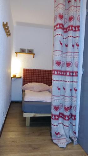 Postel nebo postele na pokoji v ubytování Les Alberges