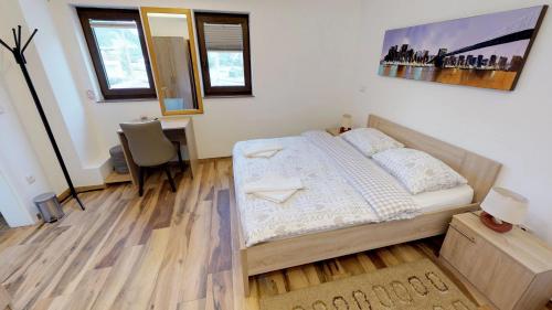 Čuček Guesthouseにあるベッド
