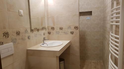 Kúpeľňa v ubytovaní Toscana Apartman