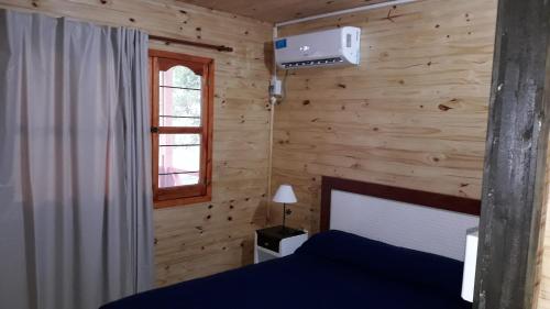 Giường trong phòng chung tại Posada del Campo