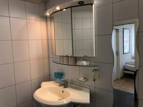 Un baño de SASS APARTHOTEL