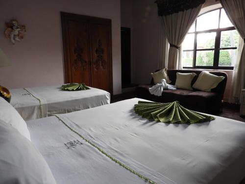 Кровать или кровати в номере Villa Bonita Les Terrasses