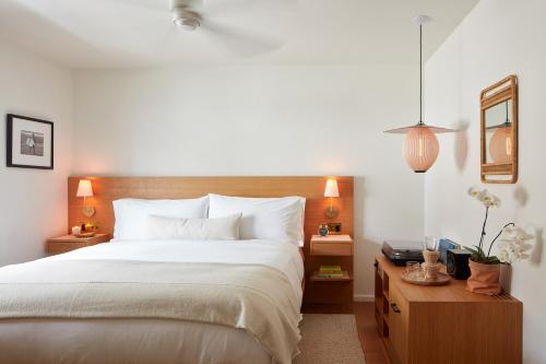 Un ou plusieurs lits dans un hébergement de l'établissement Hotel Joaquin