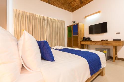Katil atau katil-katil dalam bilik di Purana Resort Koh Yao Noi - SHA Extra plus
