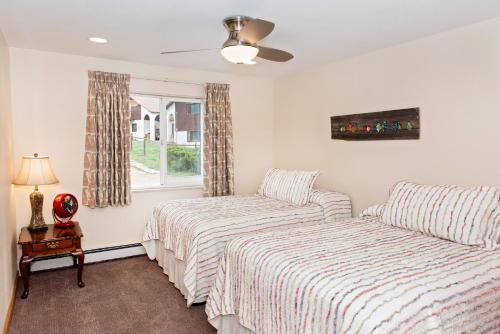 Postel nebo postele na pokoji v ubytování Red Wing Motel