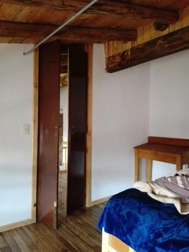 Postel nebo postele na pokoji v ubytování Casa del siglo XVII