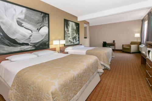 A bed or beds in a room at Super 8 by Wyndham Page/Lake Powell