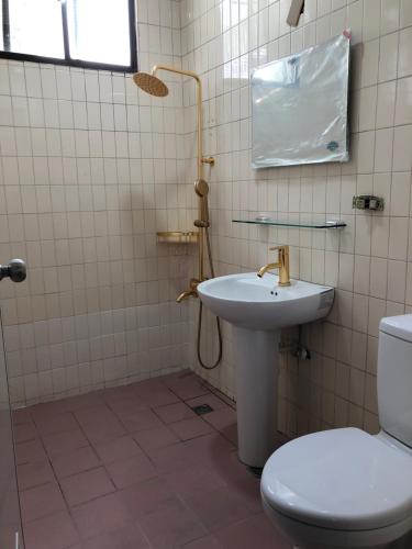 Ванная комната в Xiang Pin Hotel
