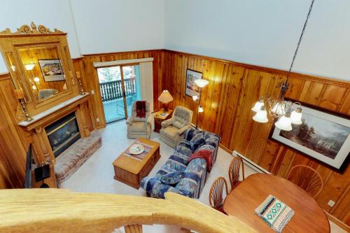 an overhead view of a living room with a fireplace at Snowfire 314A in Angel Fire