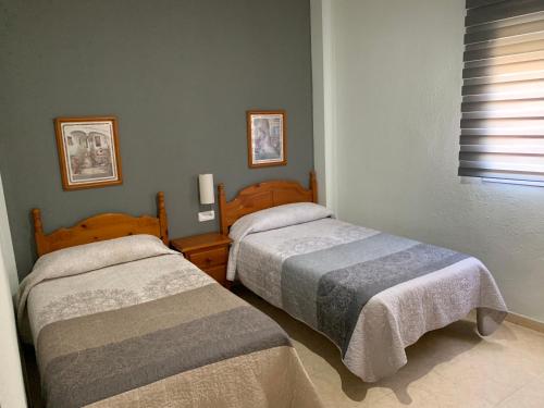 Posteľ alebo postele v izbe v ubytovaní Hotel-Restaurante la Loma