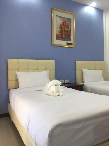 Postel nebo postele na pokoji v ubytování SABUN-NGA HOSTEL