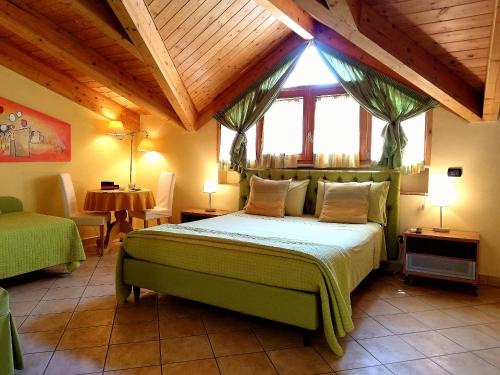 Postel nebo postele na pokoji v ubytování B&B Domus Traiani Benevento