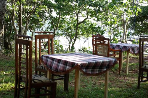 Jardín al aire libre en Sky Mountain Café with seaview
