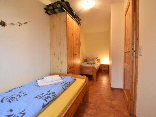Cama o camas de una habitación en Exklusiver Bungalow mit Terrasse in Rerik