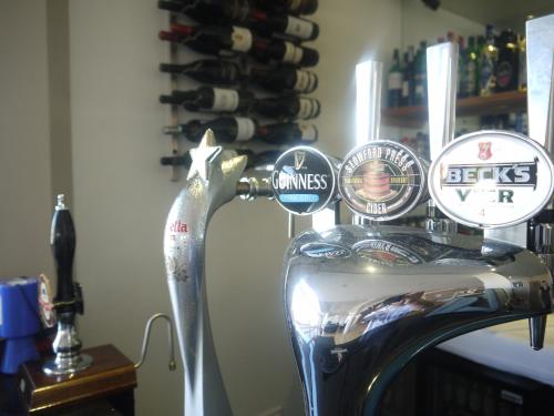 a close up of a scooter with labels on it at Boathouse Hotel in Hythe