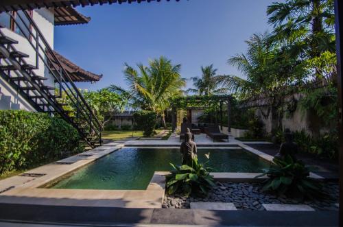 Πισίνα στο ή κοντά στο Villa Kami Ubud