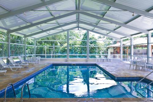 Swimming pool sa o malapit sa Eldorado Atibaia Eco Resort