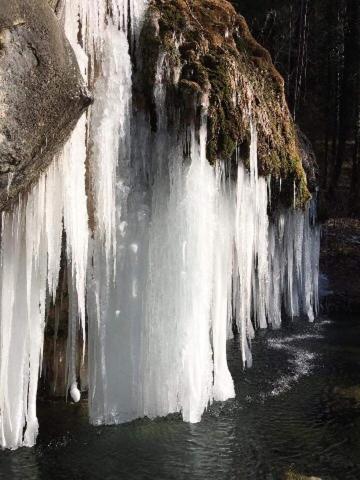 an ice wall with icicles hanging from it at Les Pantoufles dans le Pré in Eppeldorf