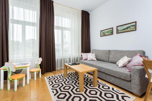 Zona de estar de Angleterre Apartments