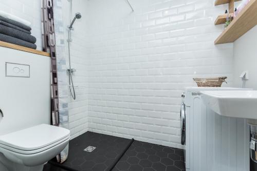 Ein Badezimmer in der Unterkunft Angleterre Apartments