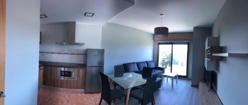 Η κουζίνα ή μικρή κουζίνα στο Apartamentos Augusto