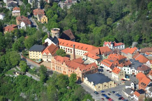 an aerial view of a large building with red roofs at LH Hotel Dvořák Tábor Congress & Wellness in Tábor