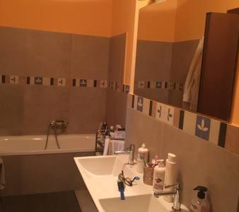 a bathroom with a sink and a bath tub at Casa Vincenza in Palermo
