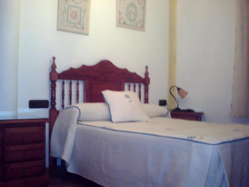 Un pat sau paturi într-o cameră la Casa Rural La Breña