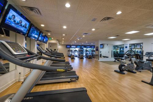 a gym with several treadmills and cardio machines at Westgate Town Center Resort in Orlando
