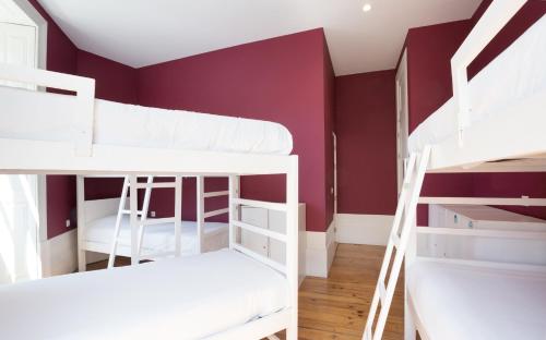 Postel nebo postele na pokoji v ubytování Best Guest Porto Hostel
