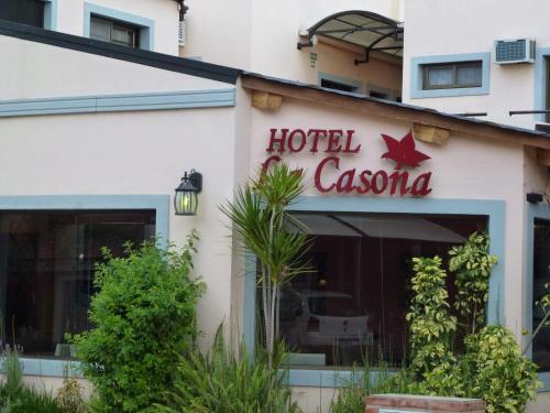 a hotel casoya sign on the side of a building at La Casona in Federación