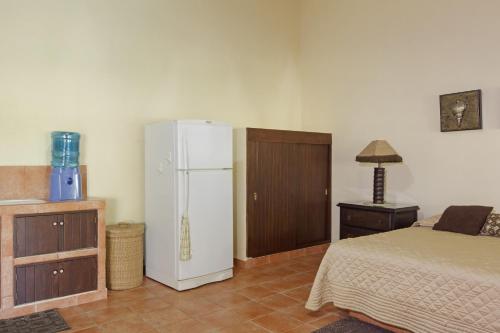Cama o camas de una habitación en The Resort at Majahua Palms